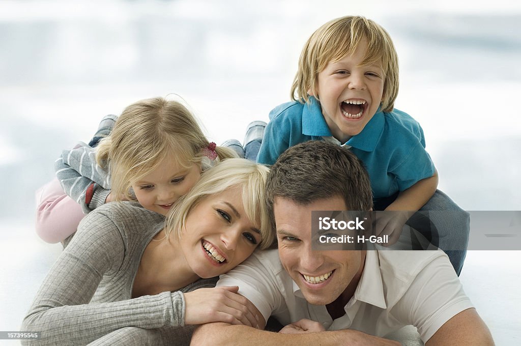 Family on thr floor  Smiling Stock Photo