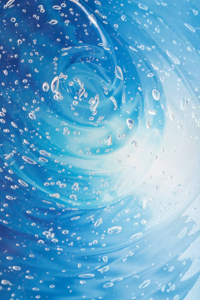 istock Water swirl with bubbles on blue background 157395720
