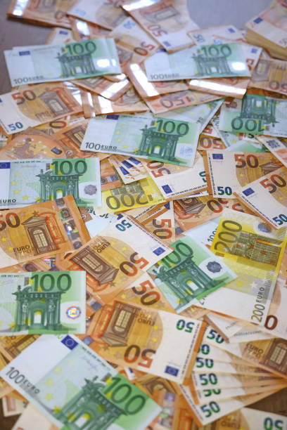istock Euro cash money on the table 1573957350