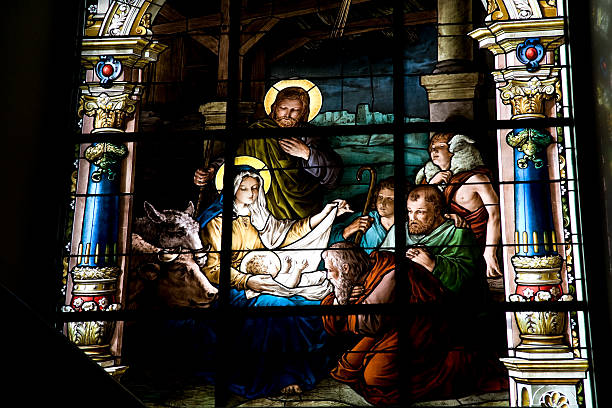 Nativity scene on stained glass window stock photo