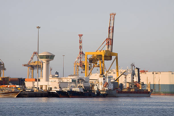 Port cranes in the city of Naples.