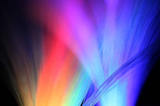Multicolored lights shining in the night stock photo