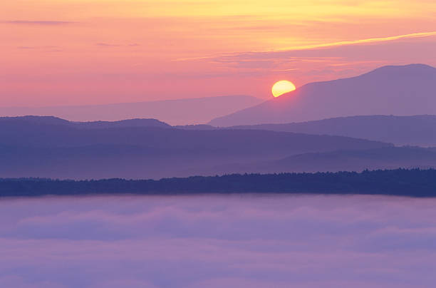 istock Sunrise and Valley Fog 157398187