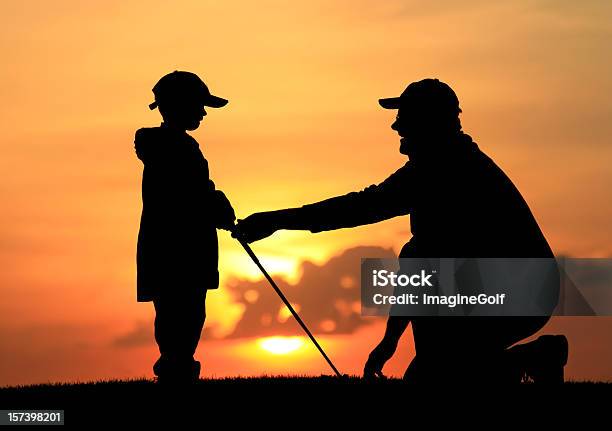 Father Giving Son Junior Golf Lesson Stock Photo - Download Image Now - Golf, In Silhouette, Coach