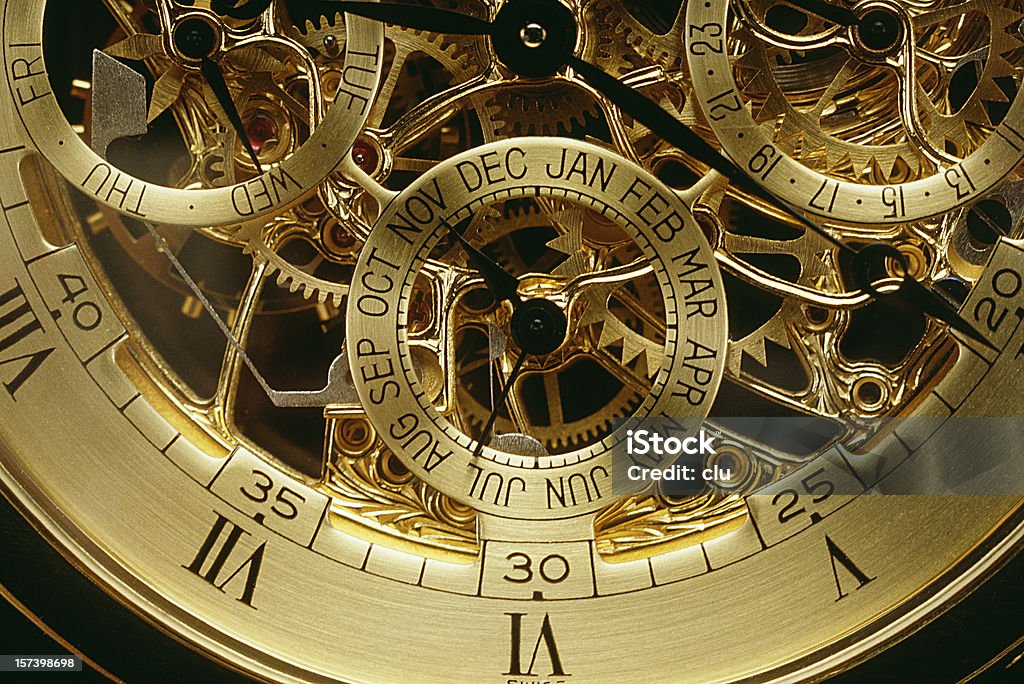 Uhrwerk orange gold - Lizenzfrei Uhr Stock-Foto