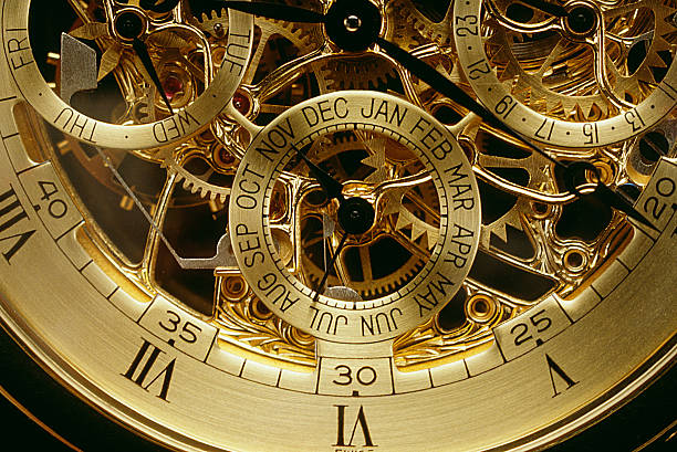 uhrwerk orange gold - gold watch stock-fotos und bilder