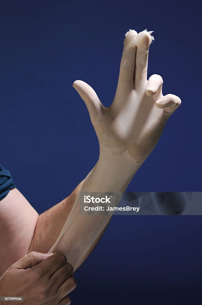 Examen físico anual; Guantes de látex dos dedos de la mano, lubricante de Gel - Foto de stock de Dos dedos libre de derechos