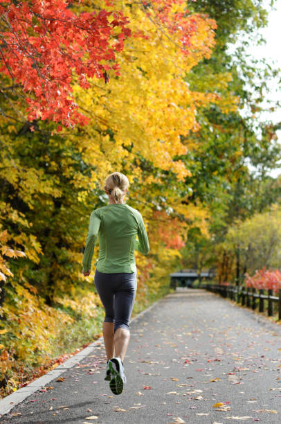 woman Runner in Fall stock photo