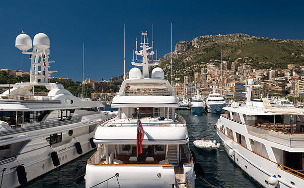 Monte Carlo, Monaco - January 18, 2012: Aerial View of Luxurious Yachts Sailboats and Boats Moored at Hercules Harbour.