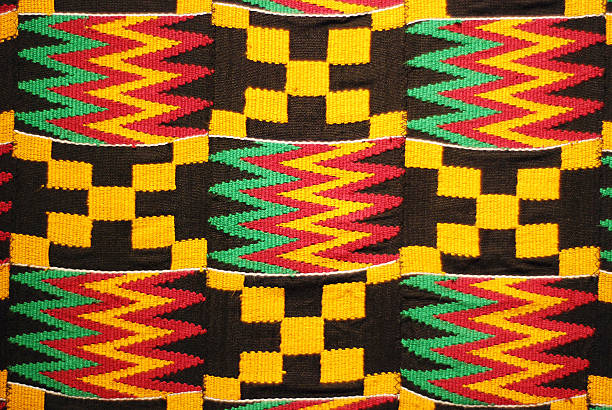 African colored pattern fabric background African colored pattern fabric background ghana photos stock pictures, royalty-free photos & images