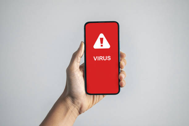 istock Man got virus alert. emergency system hacked alert. scam and cyber security concept. 1573997520