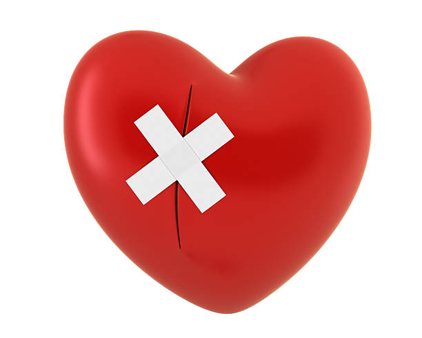 Heart  with adesive bandage stock photo