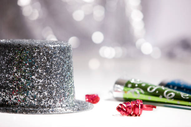 istock 2012 New Year's Top Hat and Party Horn Blowers, CopySpace 157400230