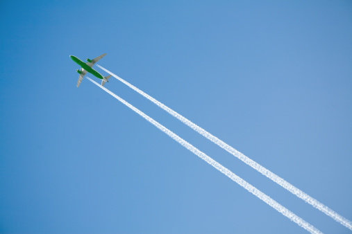 Green airplanes on a blue sky.
