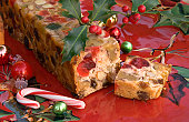 Christmas Fruit Cake & Peppermint Candy Cane, Holiday Dessert Food Background