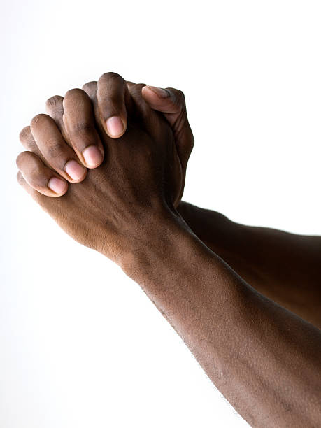 Hands praying  anglican eucharist stock pictures, royalty-free photos & images