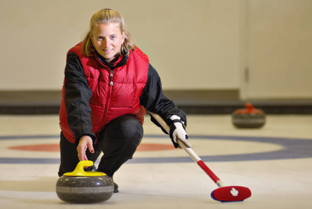 Curling Woman stock photo