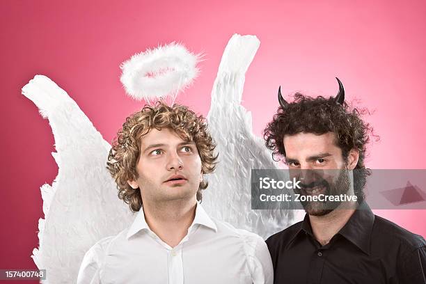 Foto de Anjo Branco E Preto Caverna Juntos e mais fotos de stock de Adulto - Adulto, Anjo, Asa animal