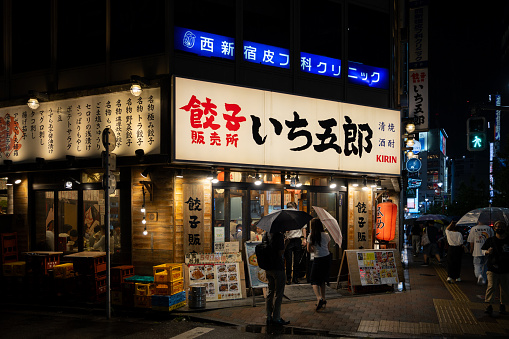 Tokyo, Japan - November 13, 2014:: Billboards in Shinjuku's Kabuki-cho district November 13, 2014 in Tokyo, JP. The area is a nightlife district known as Sleepless Town.