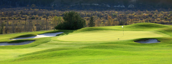 You don't have to be a golfer to appreciate the view of peak foliage in the fall.  The manicured green of the fairway highlights the color of the leaves.  This photo was taken in Lake Placid, New York in early October.