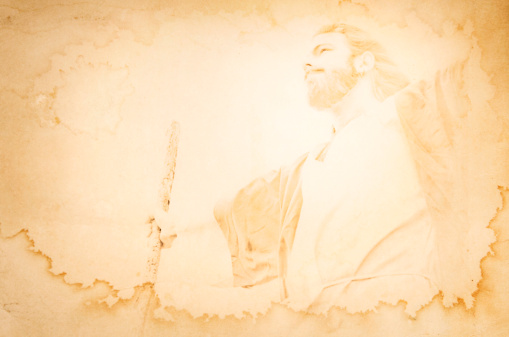 A depiction of a Christ-like Bible figure on a stained yellow/brown grunge background.  Would work great for a powerpoint presentation or Easter song lyrics backdrop.