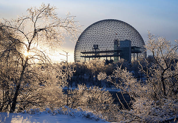 Montreal biosphere during the winter Montreal (Quebec, Canada) expo 67 metallic sphere (biosphere) in winter after an ice storm. More Montreal in lightbox... montreal stock pictures, royalty-free photos & images