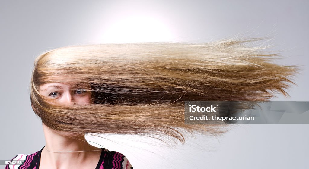 Woman facing straight ahead with hair being blown aside Strong wind blows on woman's hair

From the same series:
[url=http://www.istockphoto.com/file_closeup.php?id=8020524][img]http://www.istockphoto.com/file_thumbview_approve/8020524/2/istockphoto_8020524-typhoon.jpg[/img][/url] Wind Stock Photo