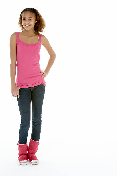 Full Length View Of Teenage Girl In Studio stock photo