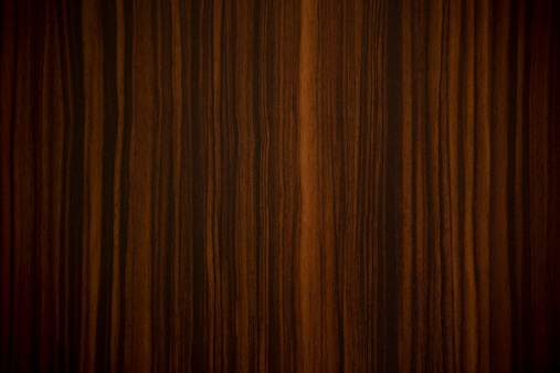 Ebony wood background with vertical stripes