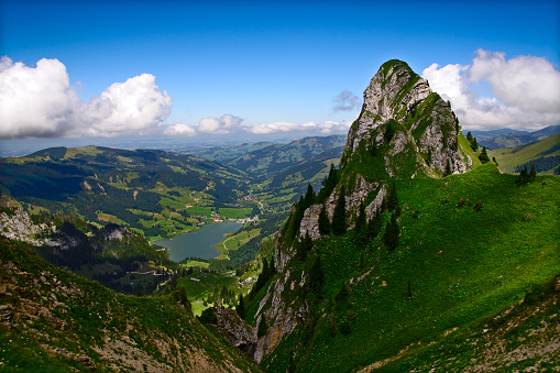 Predjama, Slovenia - June 27, 2020: Predjama Castle in Slovenia, Europe. Renaissance castle built within a cave mouth in south central Slovenia, in the historical region of Inner Carniola. It is located in the village of Predjama. Drone