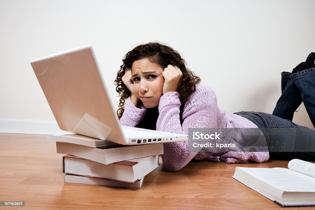 Confondu Étudiant - Photo de Fond blanc libre de droits