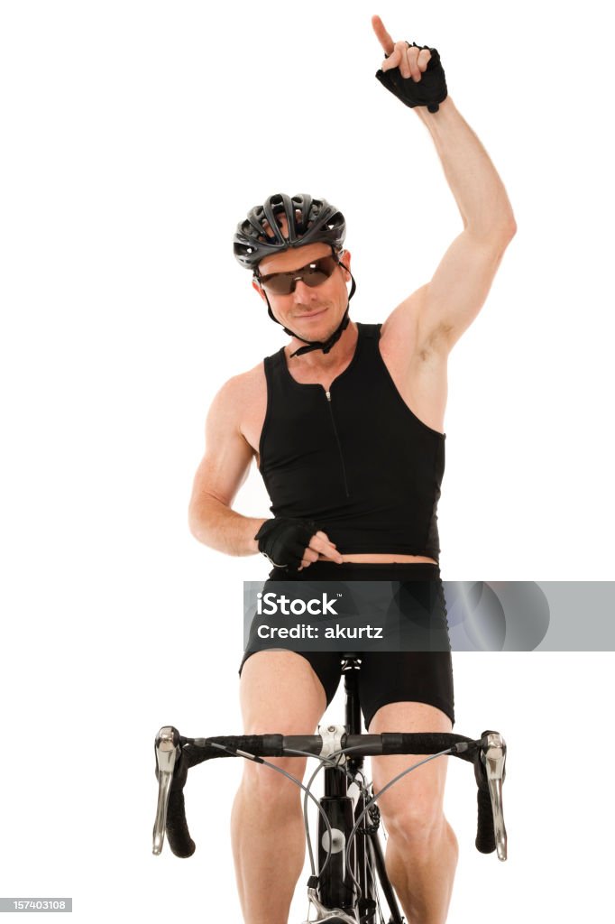 Macho maduro atleta exercício de bicicleta de corrida isolada gesto vencedor - Foto de stock de 40-44 anos royalty-free