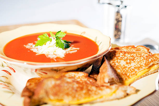 Tomato Soup with grilled cheese stock photo