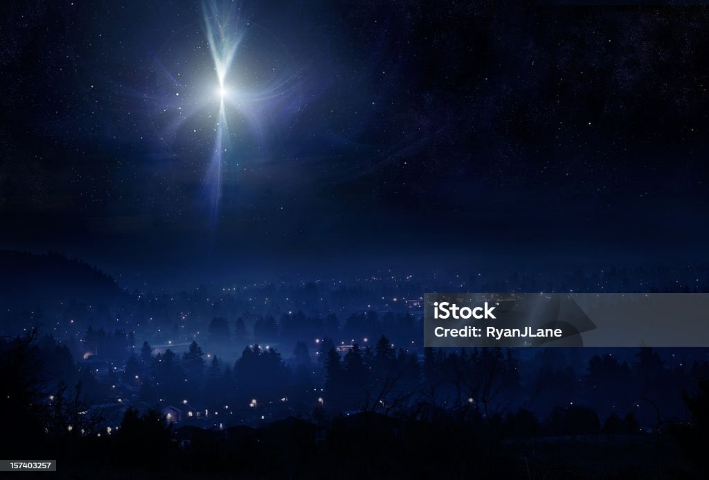 Star of Bethlehem Night Sky A conceptual photo montage, meant to represent the town of Bethlehem and the Christmas star in the night sky the evening that Christ was born. Horizontal with copy space. Christmas Stock Photo