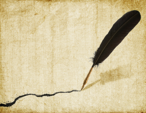 A black feathered quill with a trail of black ink