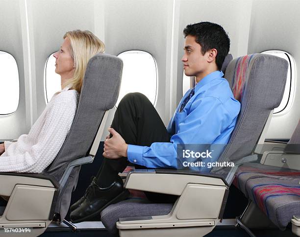 No Leg Room Stock Photo - Download Image Now - Airplane, Crowded, Uncomfortable