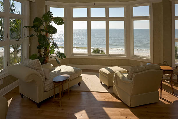 Beach House Sun Room A sun room at a beach house in Southwest Florida. beach house stock pictures, royalty-free photos & images
