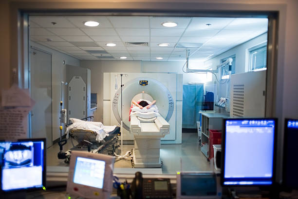 CAT scan in progress. Natural dim light in the room.http://www.stock.pointco.org/Lightbox-Healthcare.jpg