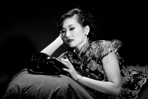 Asian diva - 1930 still. Waiting at the phone, for a call from her lover