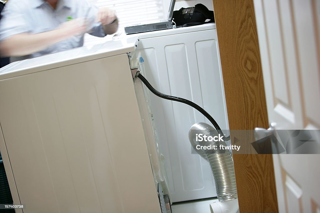 Washer Dryer Repair In Motion  Dryer Stock Photo