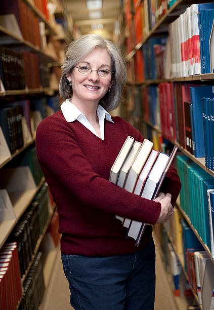 istock Woman in Library Series 157404009