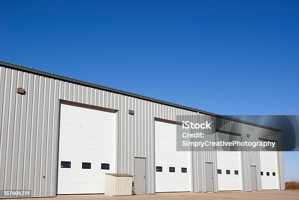 Industrial Building And Doors Stock Photo - Download Image Now - Auto Repair Shop, Door, Industrial Door