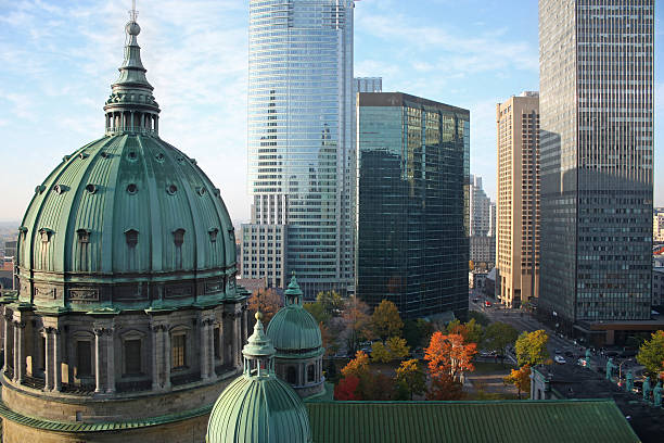 Montreal scenic Autumn picture of the dome of the "Cathedrale Marie-Reine-du-monde" (Mary Queen of the World Cathedrale) and modern highrise office buildings in Montreal, Canada montréal photos stock pictures, royalty-free photos & images