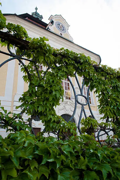 Facade of the monastery Seitenstetten ivy wreath