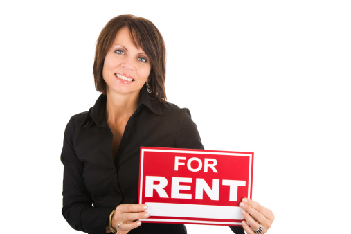Woman holding for rent sign - isolated on white background