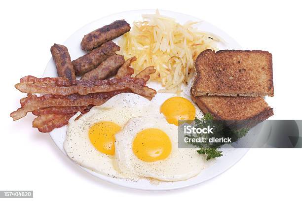 Breakfast Plate With Egg Sausage Bacon And Toast Stock Photo - Download Image Now