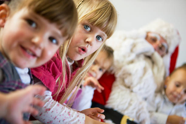 istock Children with Santa Claus 157404883