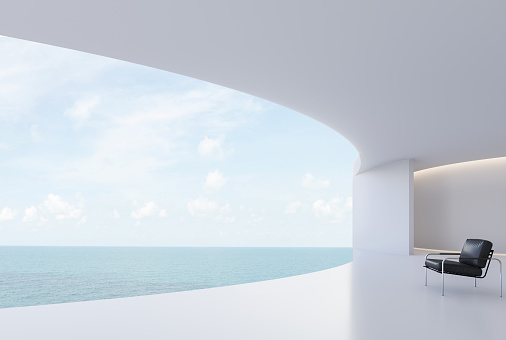 istock Minimal style curve white house curve terrace with sea view 3d render 1574050740