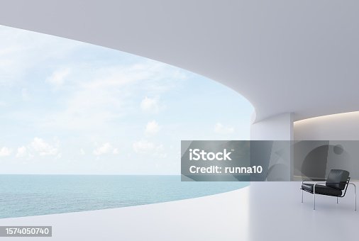 istock Minimal style curve white house curve terrace with sea view 3d render 1574050740