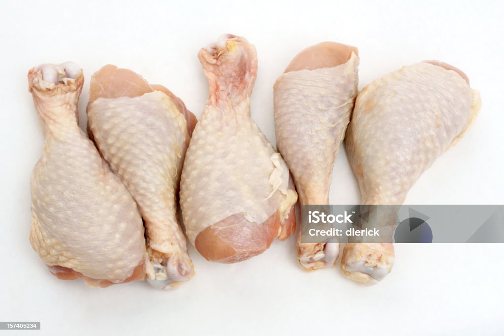 Cinq uncooked ou les manchons de poulet - Photo de Aliment cru libre de droits